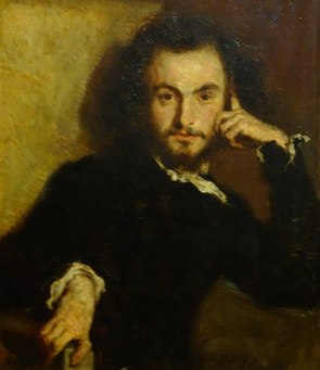 Retrato pintado de um homem branco de uns 30 anos, com a mão enconstada no rosto, ele tem bigode, barba e cabelo escuro