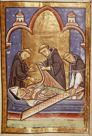 Iluminura medieval mostrando integrantes religiosos realizando um ritual p&oacute;s morte