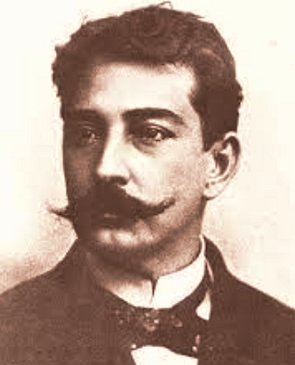 Foto de Alu&iacute;sio Azevedo, homem jovem, branco, cabelos escuros curto e bigode.