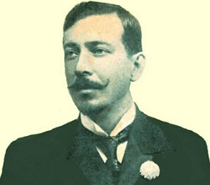 Foto em preto e branco de Joaquim Os&oacute;rio Duque Estrada, homem branco de meia idade com cabelo curto escuro e bigode com pontas