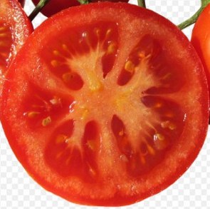 Foto de um tomate cortado ao meio mostrando a parte interna