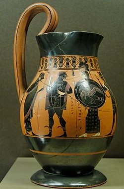 Vaso de cer&acirc;mica com al&ccedil;a, preto e amarelo com pinturas de figuras humanas
